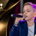 Povestea lui David Crăciun - elevul din Craiova care a devenit cel mai tânăr solist din „Hollywood in Songs”