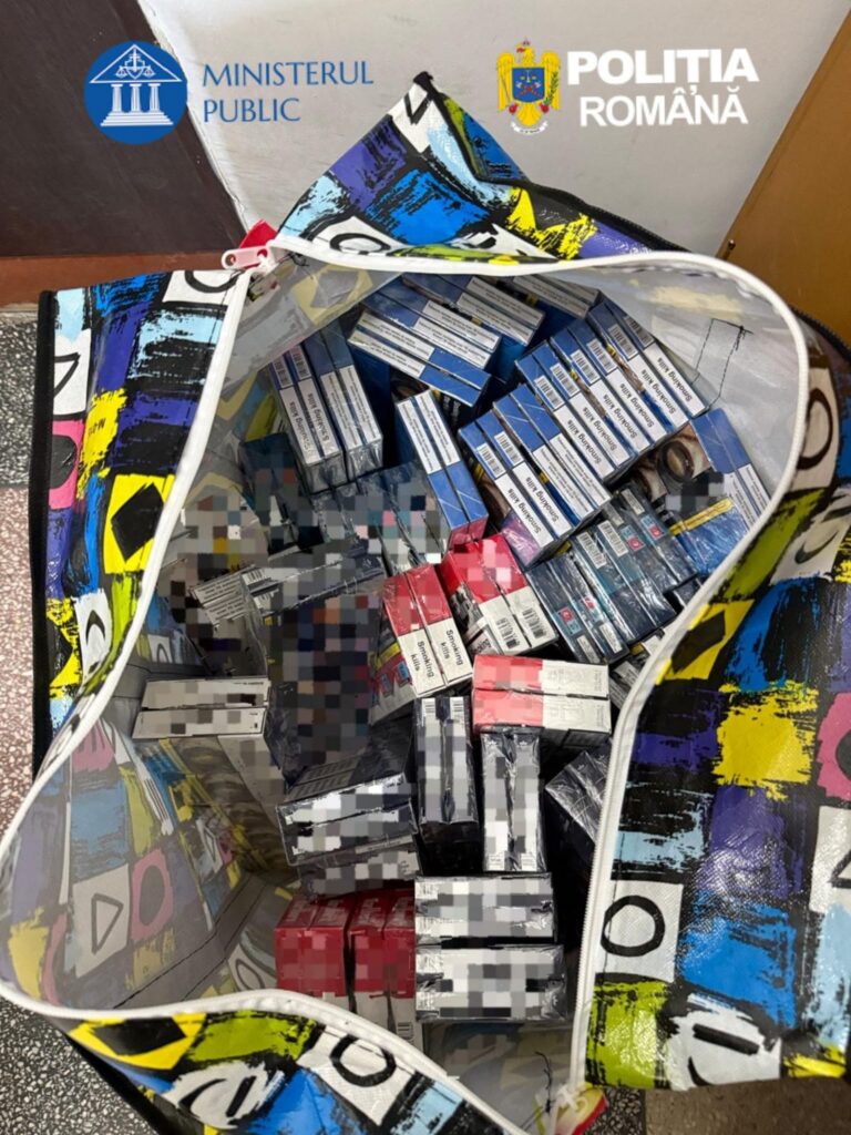Colorful backpack filled with cigarette boxes spilling out, against a backdrop with Romanian police logos on the wall
