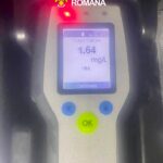 Breathalyzer reading 1.64 mg/L on a Dräger Alcotest 7510, Romanian Police branding visible above the device, indicating an alcohol test result.