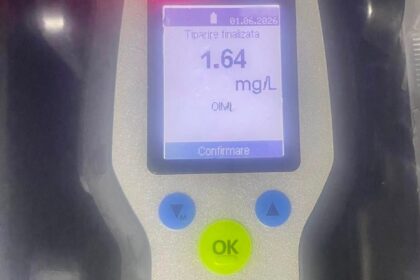 Breathalyzer reading 1.64 mg/L on a Dräger Alcotest 7510, Romanian Police branding visible above the device, indicating an alcohol test result.