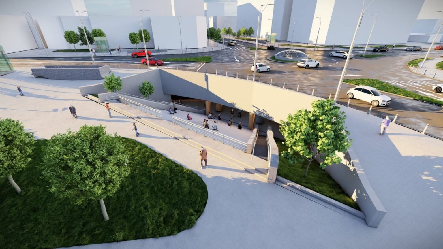 Sunken entrance to an underground transit station with stairs and ramps, pedestrians, and surrounding trees in a modern city plaza.