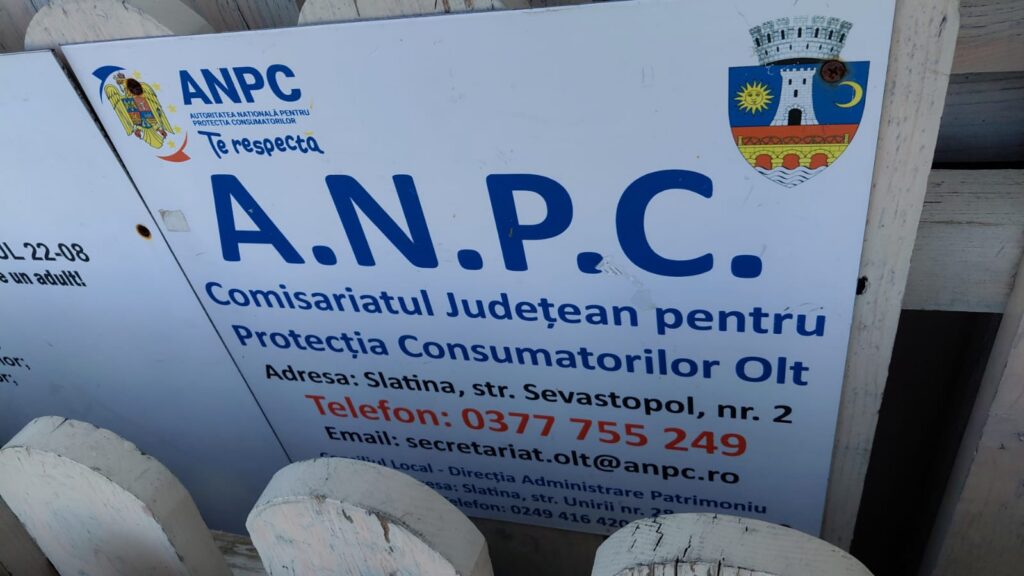 Public consumer protection sign for ANPC in Slatina, Romania, with crest and contact details in blue text.