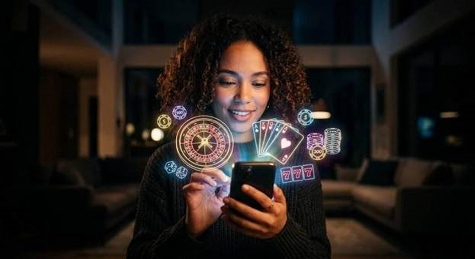 don cover - Jurnalul Olteniei – Știri din Craiova și Oltenia Woman smiling at her phone with a holographic display of casino icons (roulette wheel, cards, chips) floating above the screen.