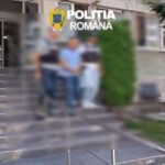 Blurry group standing on concrete steps in front of a government building; 'POLITIA ROMANA' logo at the top.