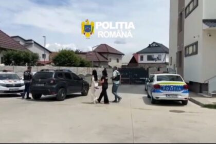 Group of people walking past parked police cars in a residential area; 'Poliția Română' watermark in the sky above.