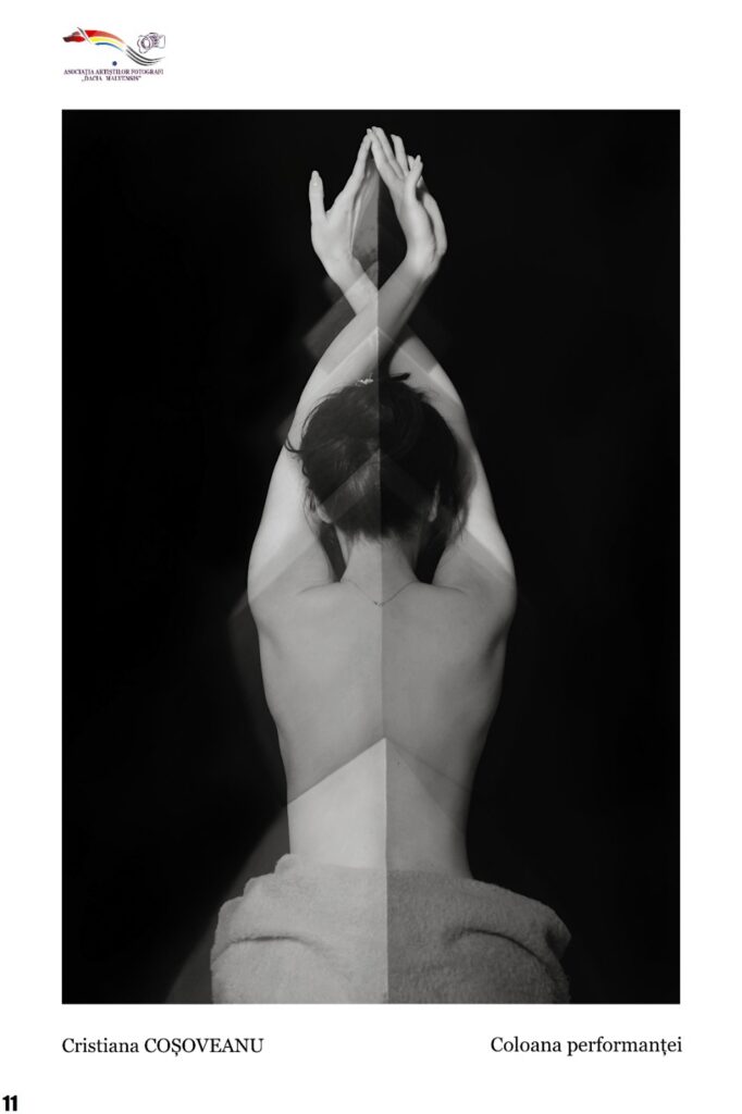 Back view of a topless woman with arms raised, hands pressed together above her head, wearing a towel around the hips; a double-exposure overlay on a black background (performance artwork).
