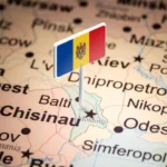 Flag of Moldova pinned on a map over Chișinău, highlighting Moldova's location in Europe.