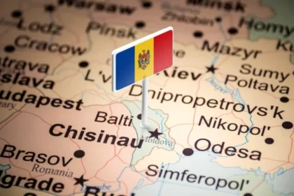 Flag of Moldova pinned on a map over Chișinău, highlighting Moldova's location in Europe.