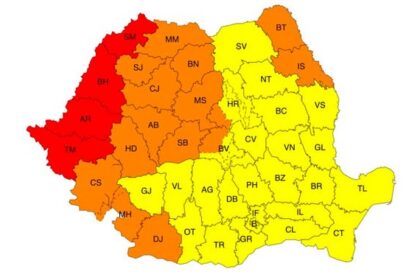 Map of Romania showing counties shaded in red, orange, and yellow.