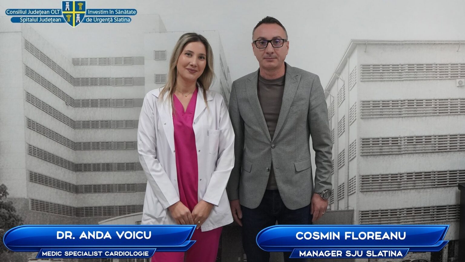 Dr. Anda Voicu, cardiology specialist, and Cosmin Floreanu, manager, pose in front of a hospital backdrop.