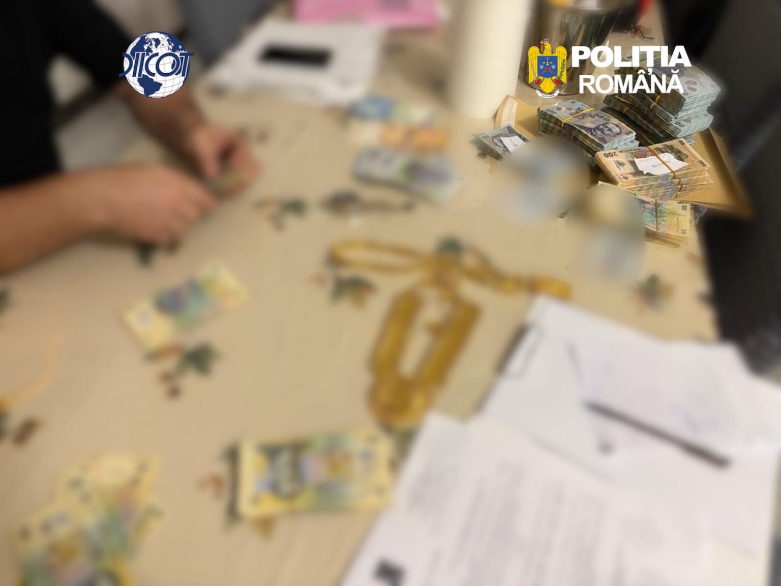 Blurred table with cash stacks and documents; DIICOT and Poliția Română logos in the corners.
